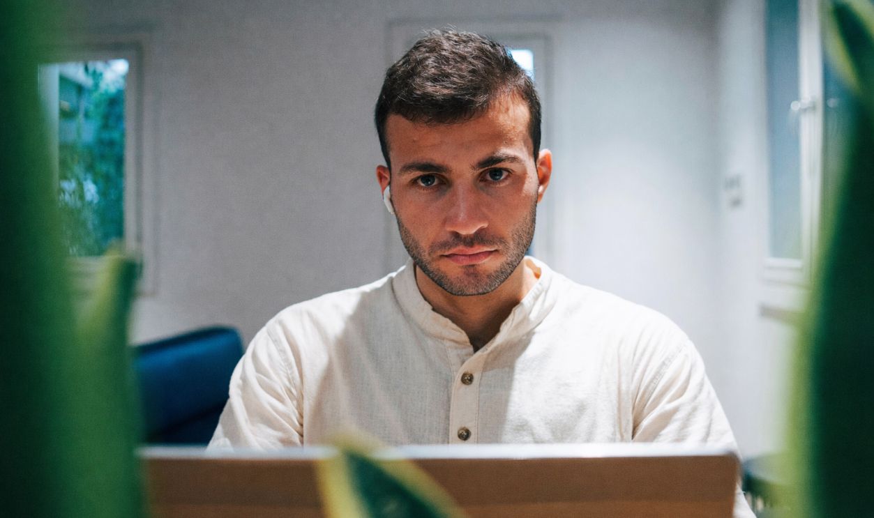 a guy looking into the camera