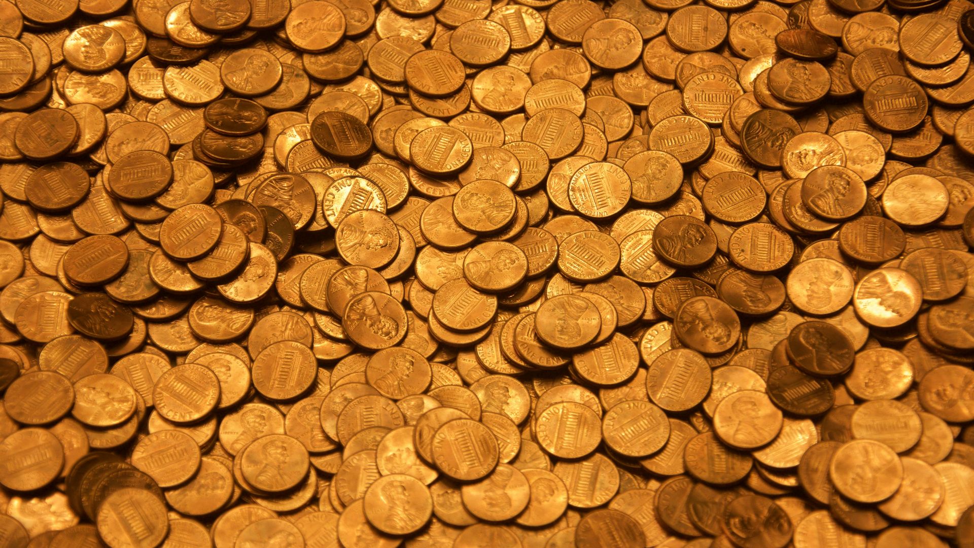 brown round coins on brown wooden surface
