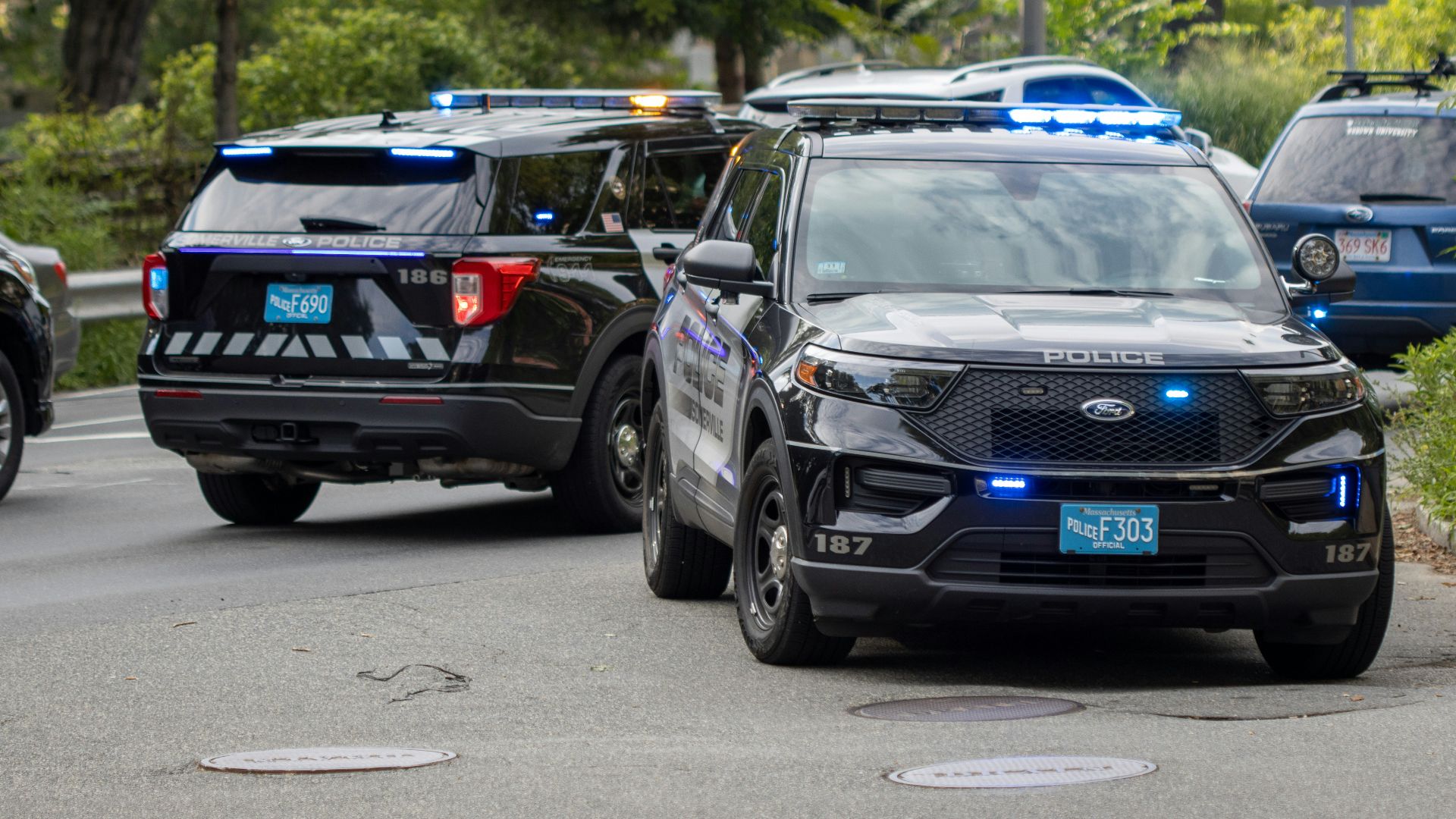 black mercedes benz suv on road during daytime