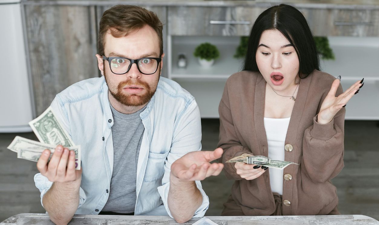 A Couple Sitting at the Table