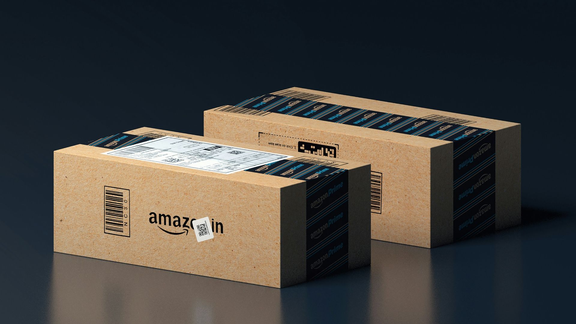 two boxes of amazon are stacked on top of each other