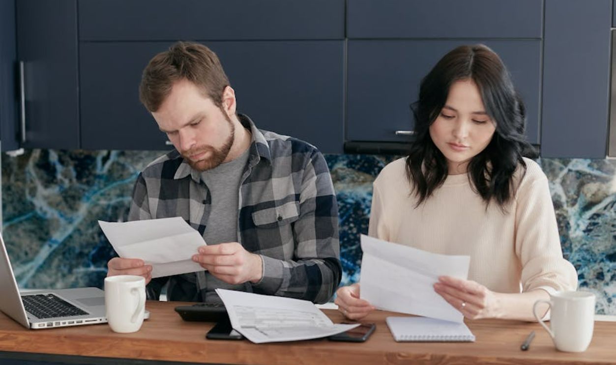 Couple reading documents
