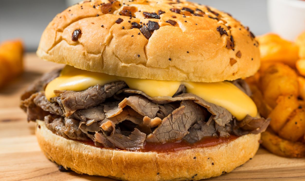 Savory Roast Beef and Cheddar Sandwich with Curly French Fries