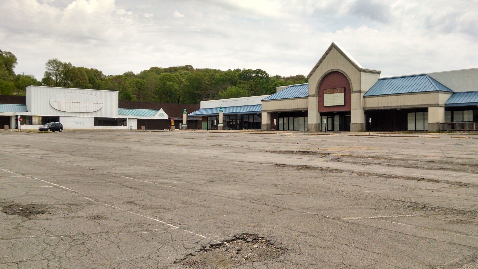 Empty retail buildings on the southern side of the Northern Lights Shopping Center in Economy, Pennsylvania, United States. The taller building on the right was formerly a Hills store and later an Ames store before abandonment.