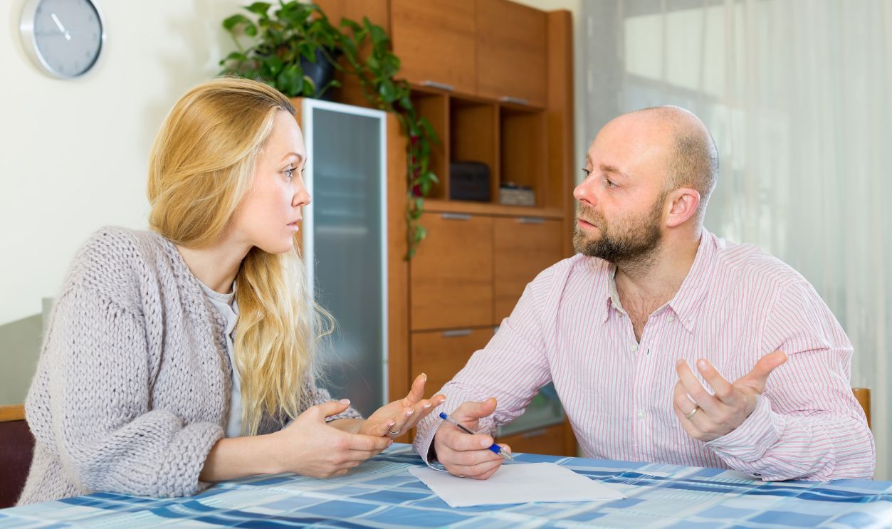 Shutterstock-338664626, Quarrel in young family over financial documents at home