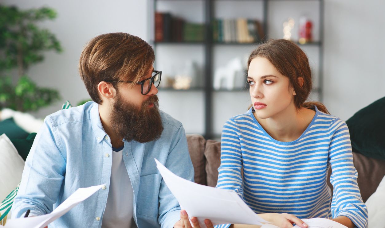 Shutterstock-1291431850, married couple with bills receipts documents and a laptop at home