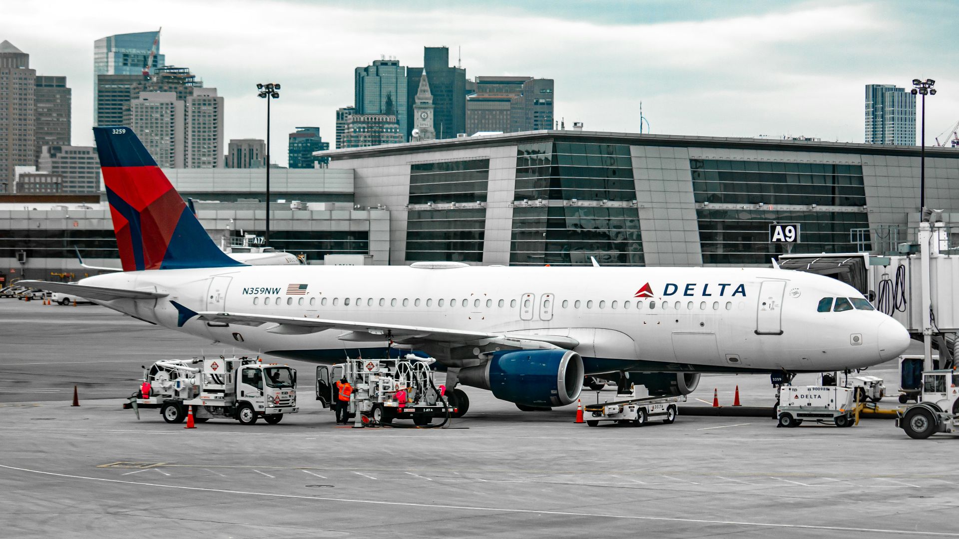 white passenger plane on airport during daytime