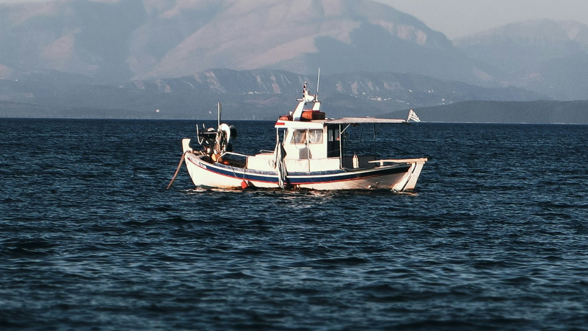 a boat sailing in the sea