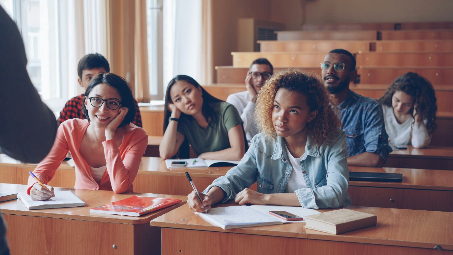 Students attentively listening in a lecture hall