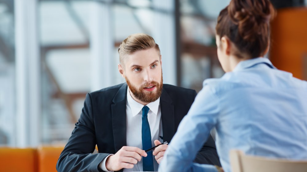 Portrait Photo of a man during a job interview in office