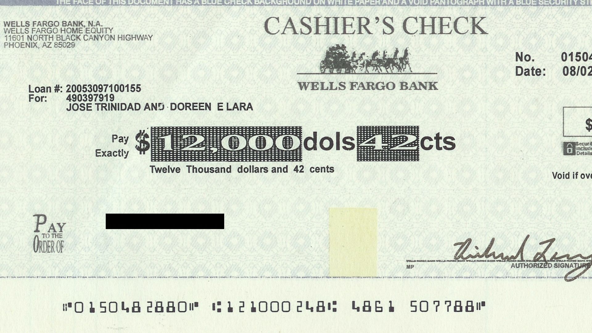 A scan of a counterfeit cashier's check that is made to appear to be issued by Wells Fargo Bank. Some personal information regarding the recipient has been blacked out. It is shown to be from J