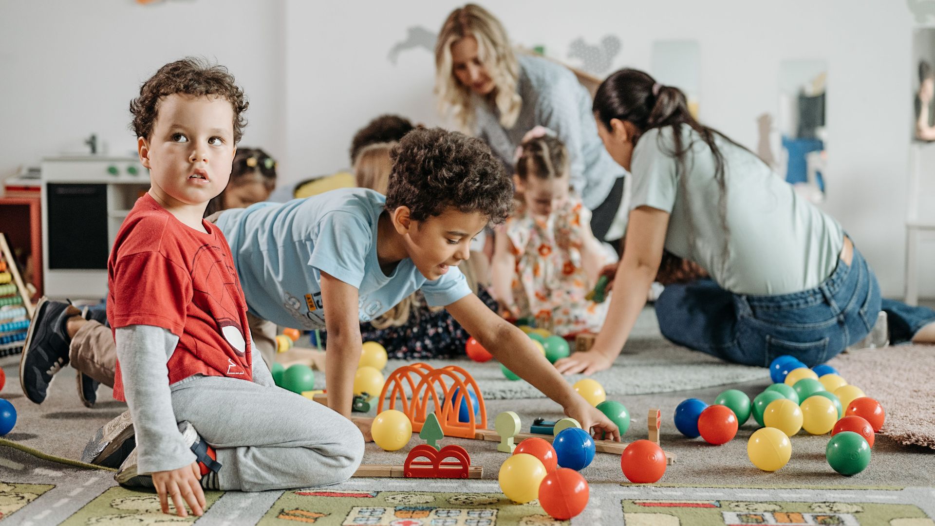 Kids engaging in play and learning activities at a kindergarten. Fun and colorful environment.