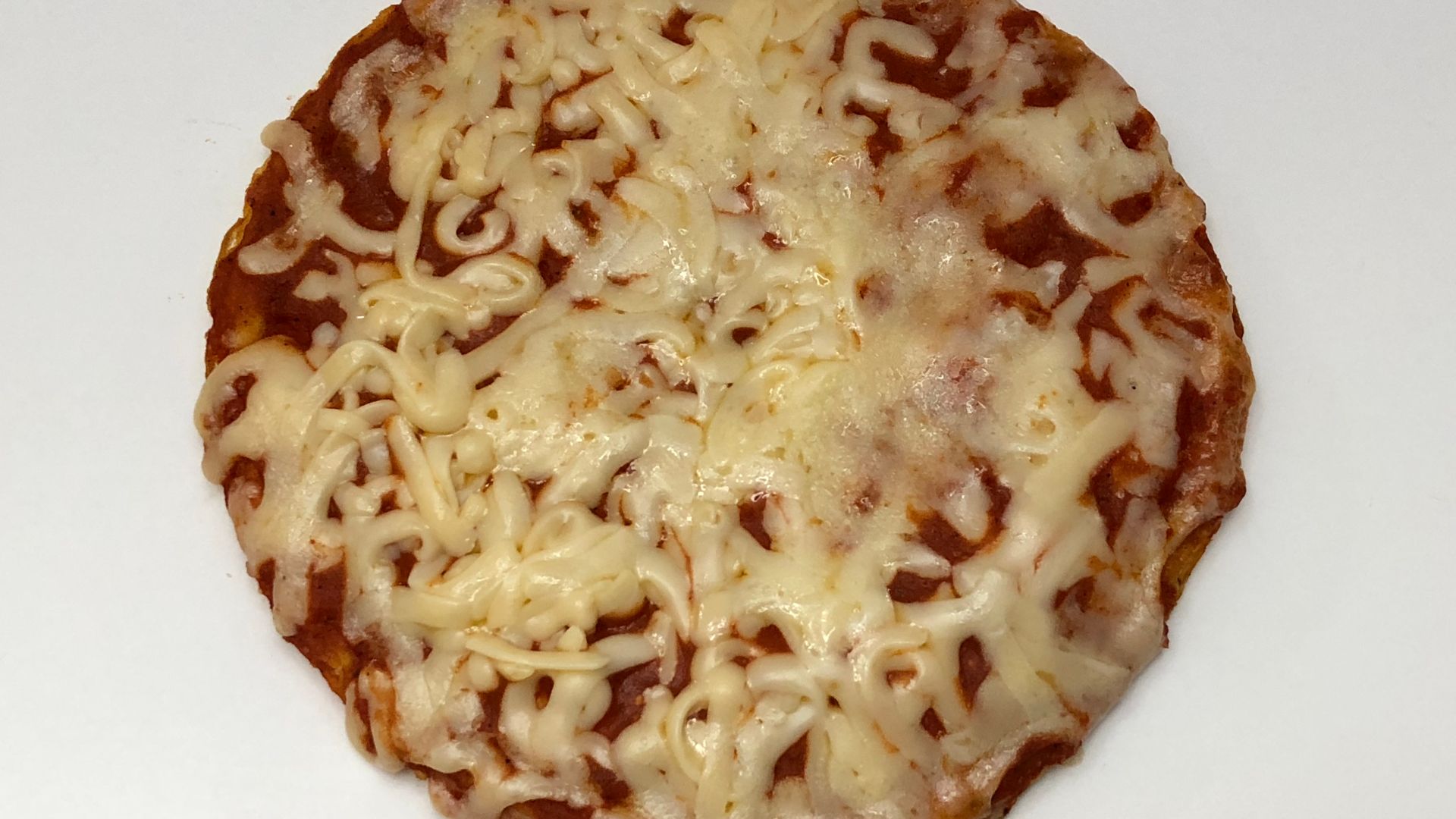 A Celeste Original 4 Cheese Pizza for one after heating in a microwave in the Franklin Farm section of Oak Hill, Fairfax County, Virginia
