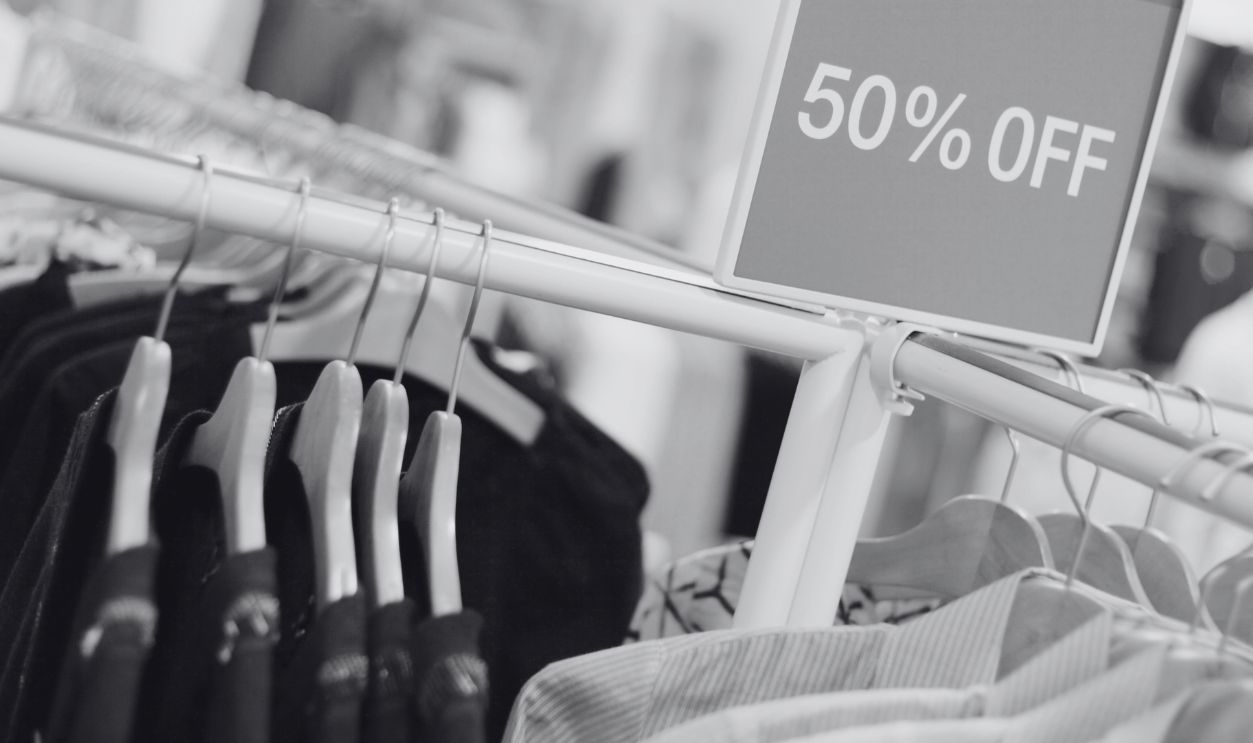 Clothing in fashion Store. Retail shopping sale concept.