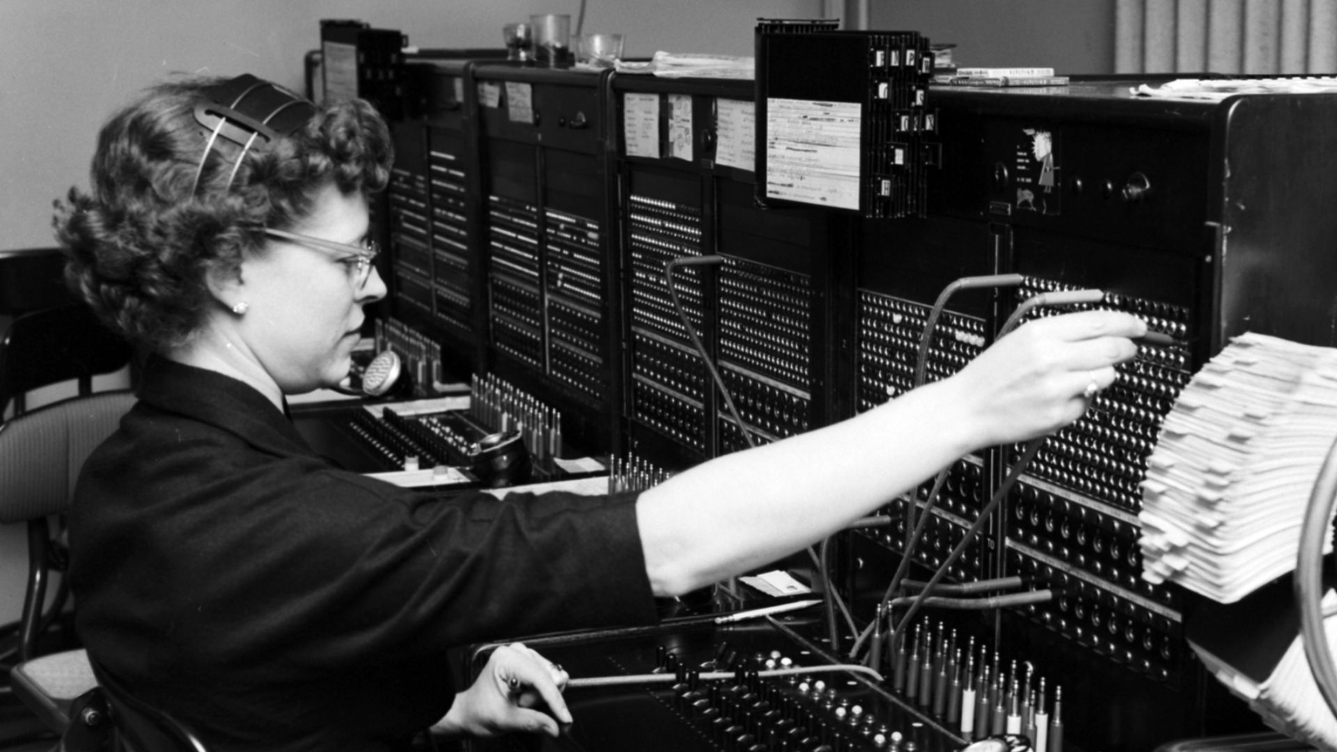 A night telephone operator working for the City of Seattle, December 1960.