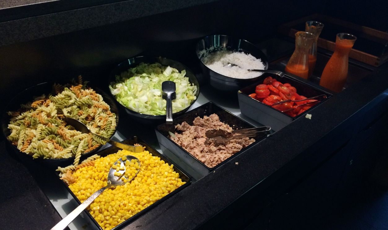 Barcelona, Spain, 02 September 2017: Salad buffet with freshly cut vegetables in a frequent flyer lounge