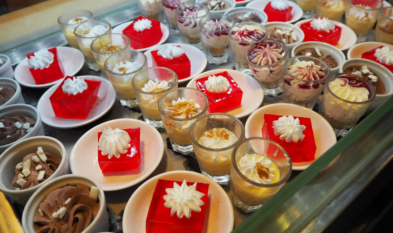 sweet dessert in small cup, red jelly and chocolate mousse at sizzler