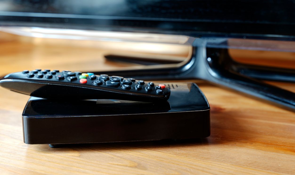 Digital TV box and Smart TV in living room with sun light in the morning
