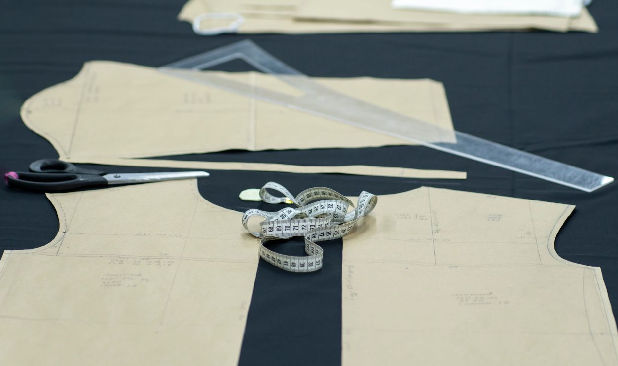 paper pattern of clothes on the table in the dressmaking workshop