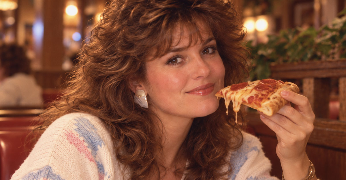 1980s woman eating pizza