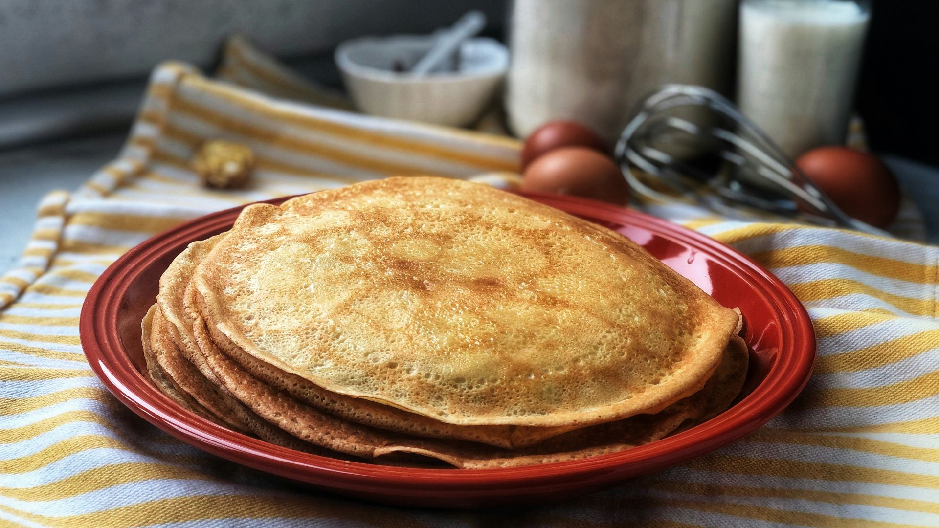 brown pie on red round plate