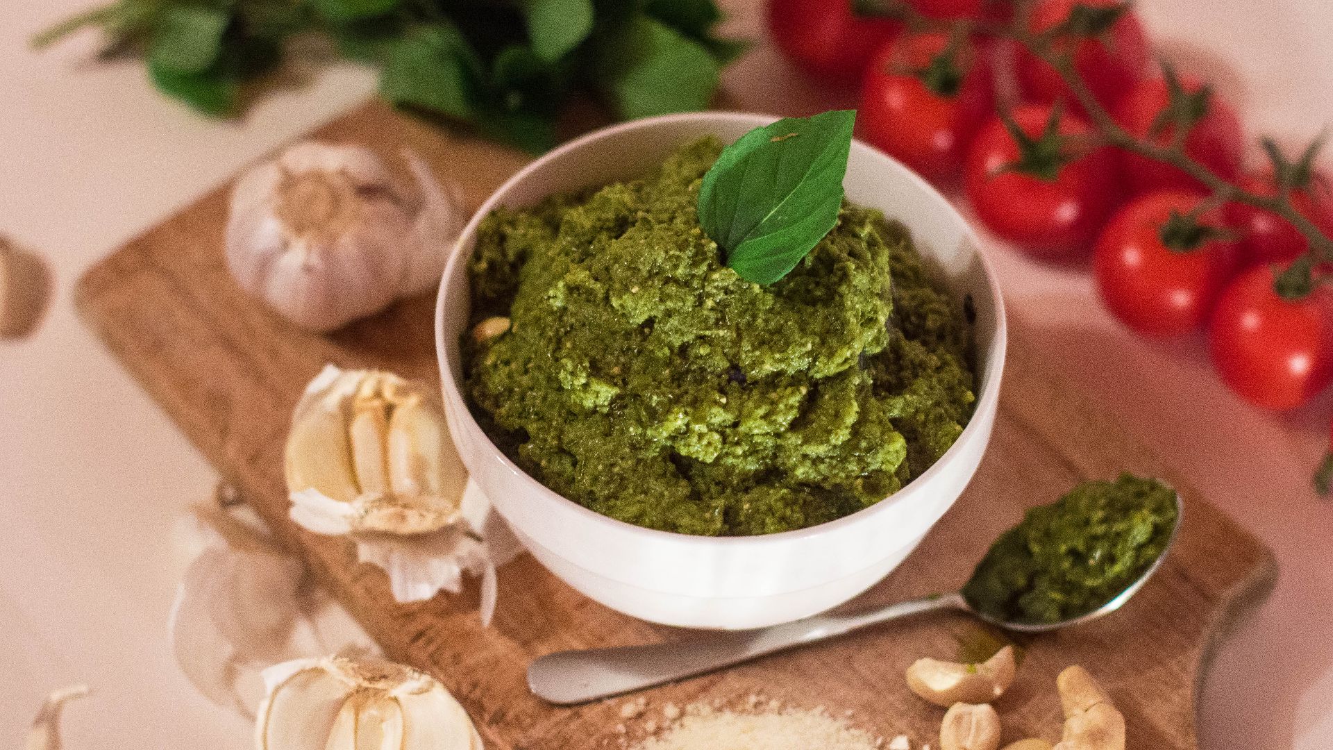 Pesto -  a sauce made from crushed garlic, European pine nuts, coarse salt, basil leaves, Parmigiano-Reggiano and pecorino sardo, all blended with olive oil.