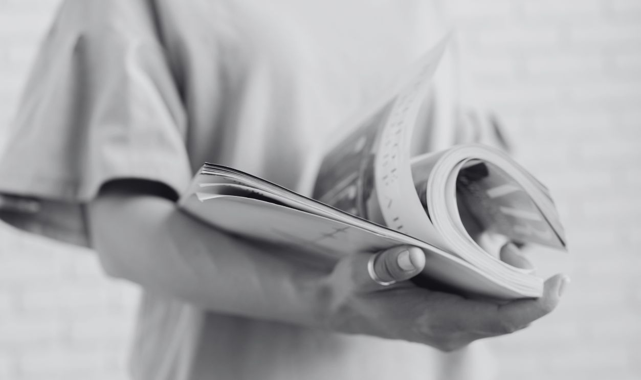 woman reading a magazine