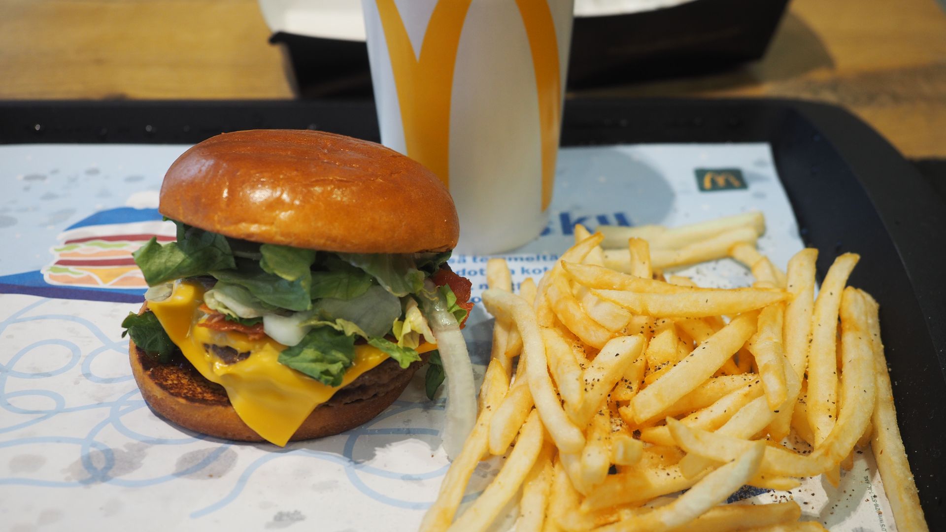 A hamburger and French fries served at a McDonald's restaurant in Hakaniemi, Helsinki, Finland in February 2023.