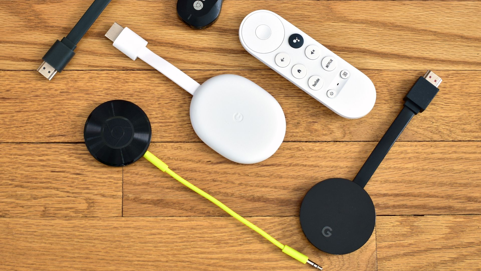 A collection of Chromecast media streaming devices by Google
Black devices, clockwise from top left: 2nd-generation Chromecast, 1st-generation Chromecast, Chromecast Ultra, and Chromecast Audio
White device, in center: Chromecast with Google TV and its re