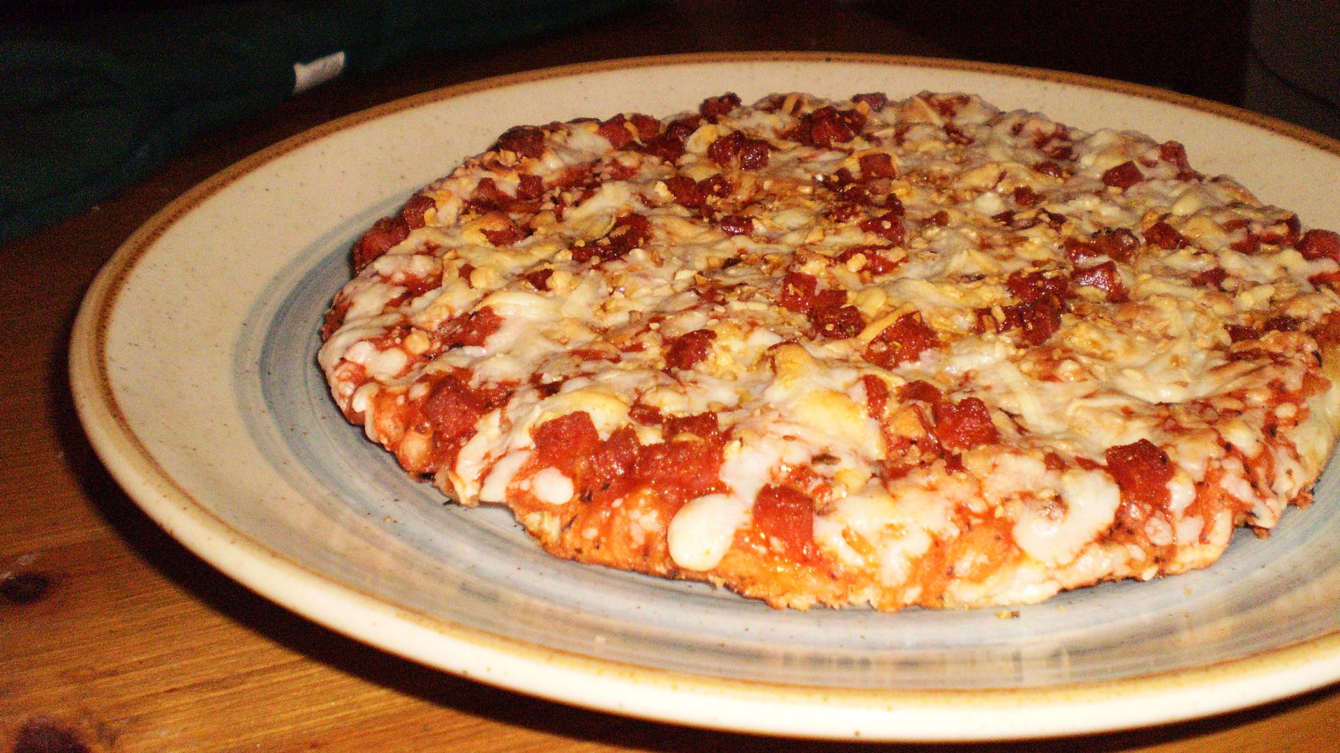A cooked Totino's pizza. Perreroni variety, with a little added garlic