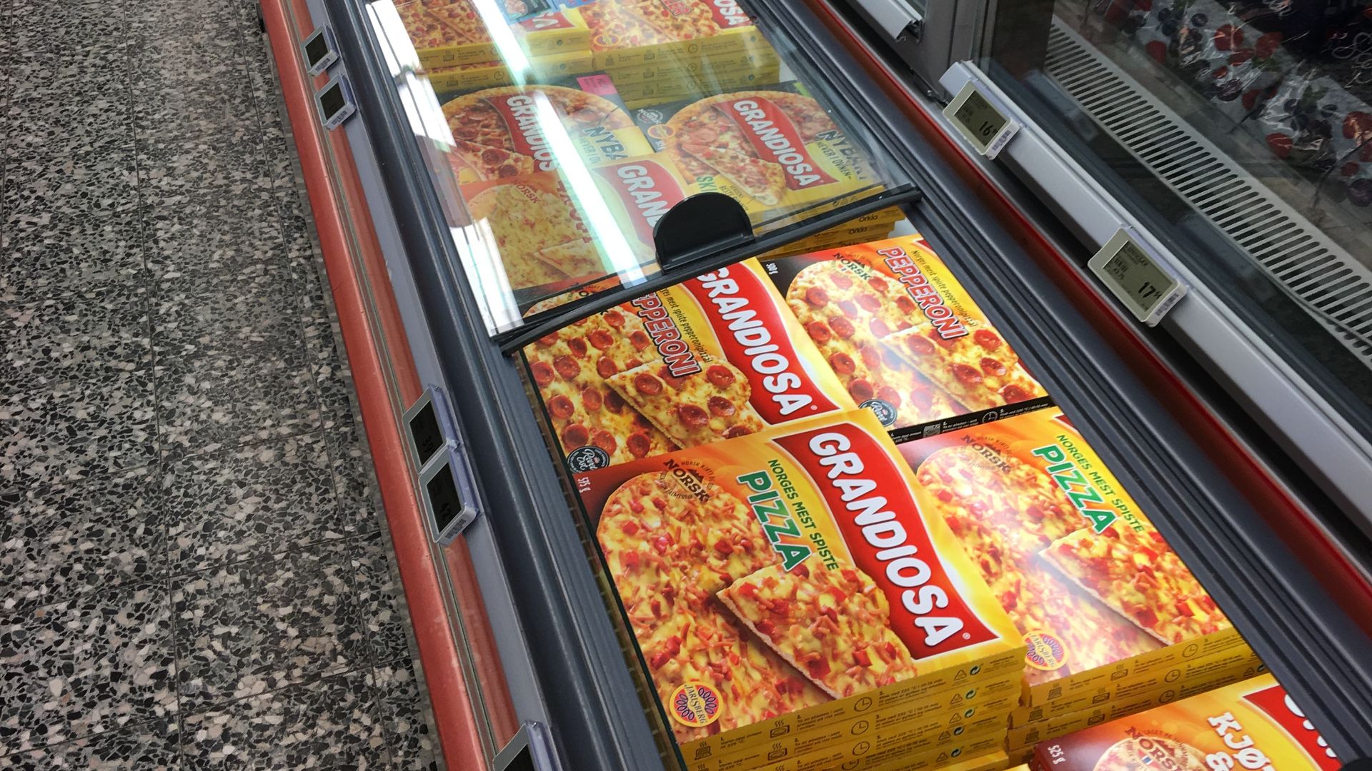 Frozen Pizza Grandiosa in chest freezer at Spar Supermarket in Tjøme, Norway 2017-12-05