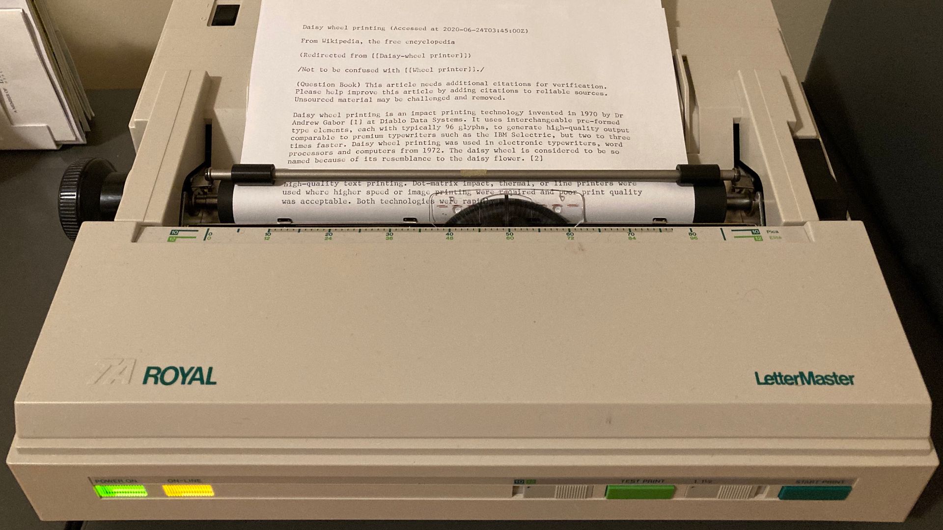 This is a TA Royal LetterMaster daisywheel printer, originally manufactured around 1985, printing a document on A4 paper.