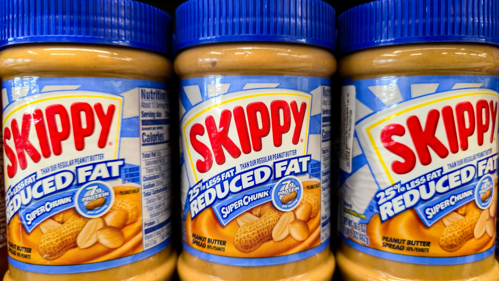 Three jars of skippy reduced fat peanut butter