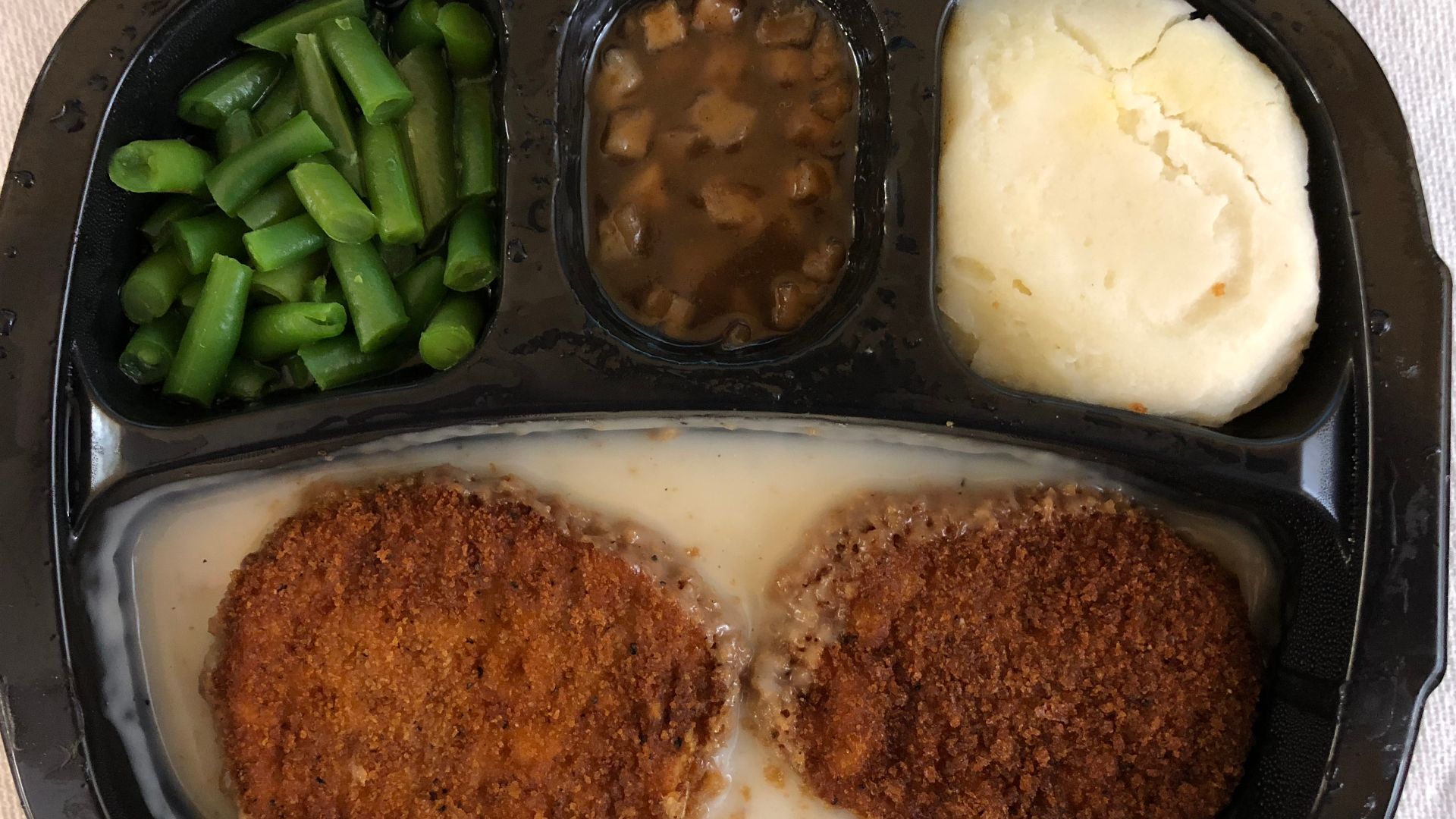 A Hungry-Man Country Fried Chicken TV dinner after being heated in the Franklin Farm section of Oak Hill, Fairfax County, Virginia