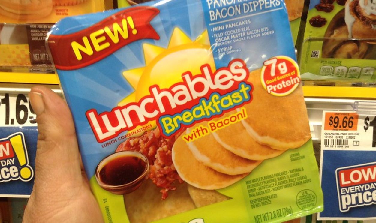 Close-up Photo of person holding Lunchables Breakfast