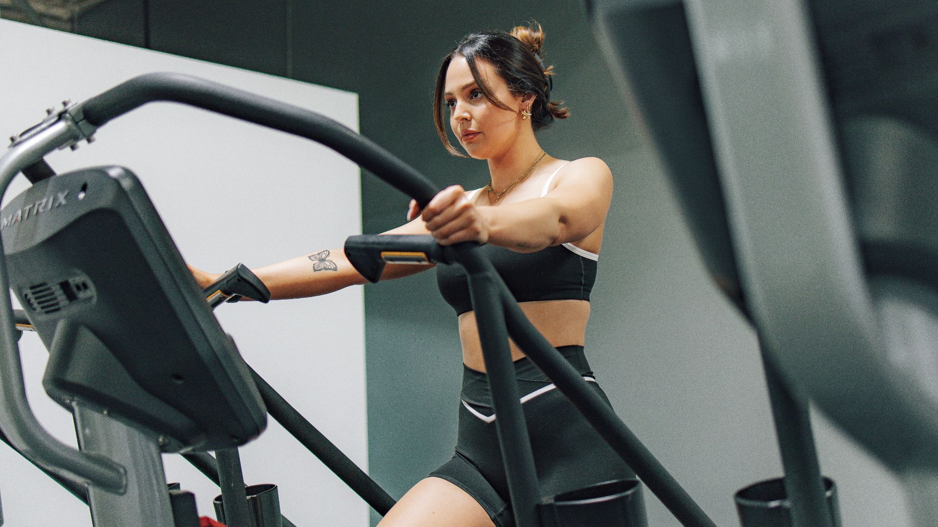 a woman on a treadmill in a gym
