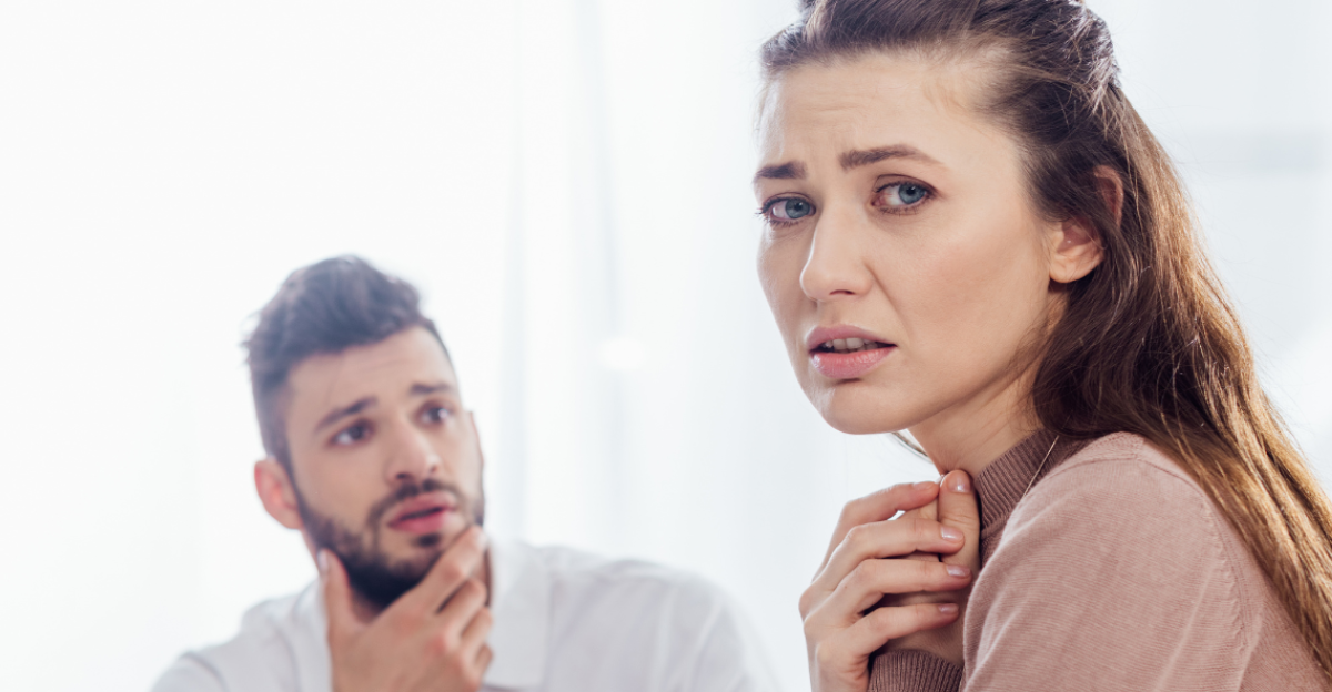panoramic shot of worried woman looking at camera during group therapy session
