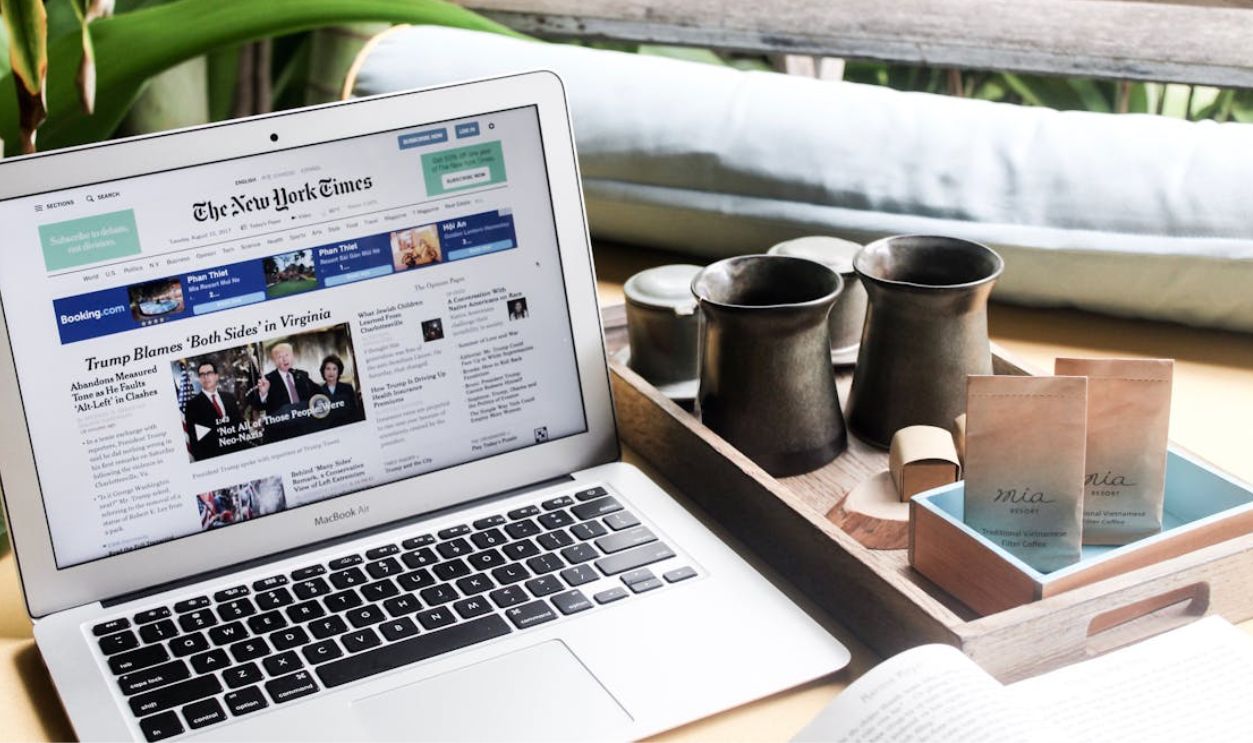 Laptop with News on the Screen