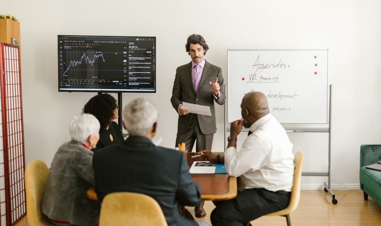 People Looking at the Man Presenting