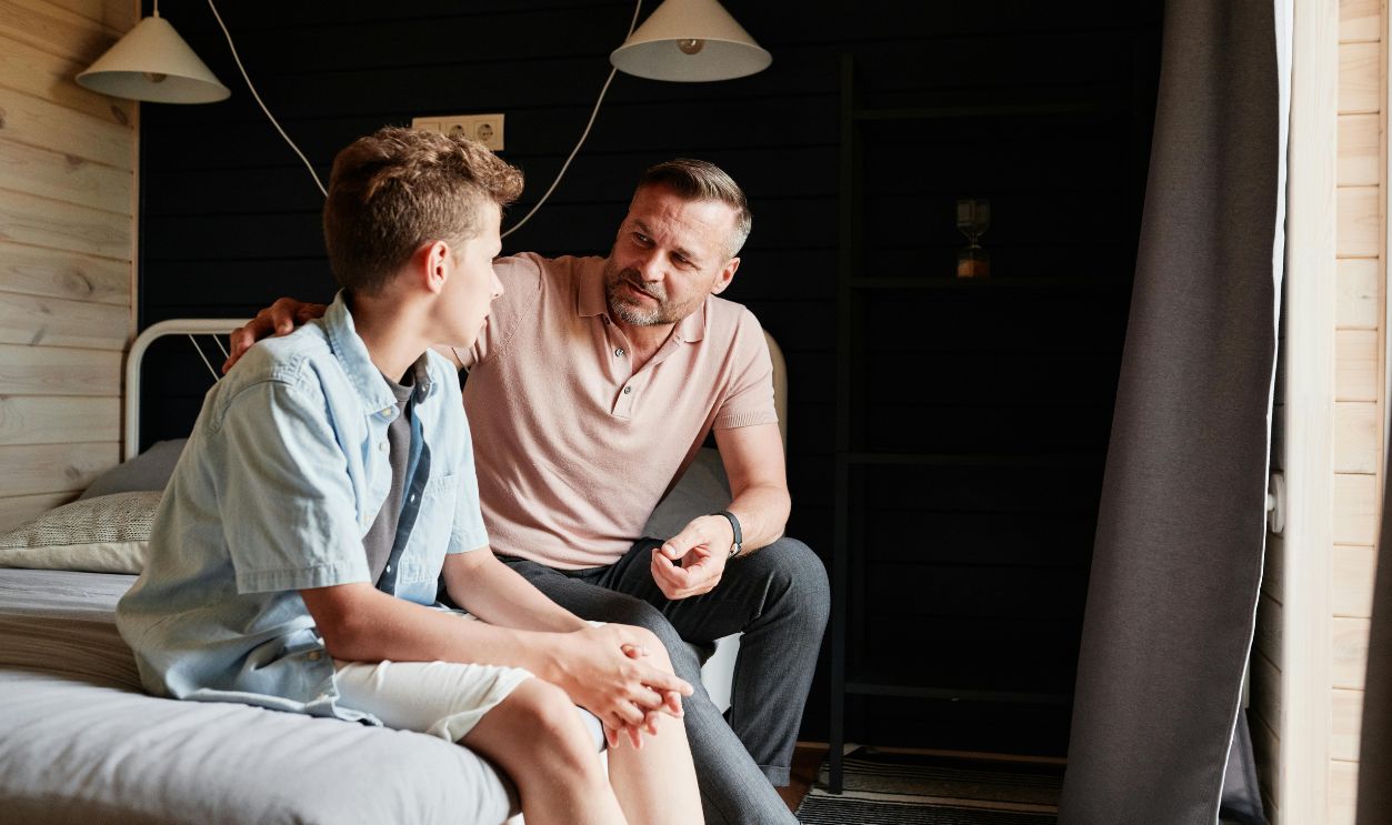 Father talking to son