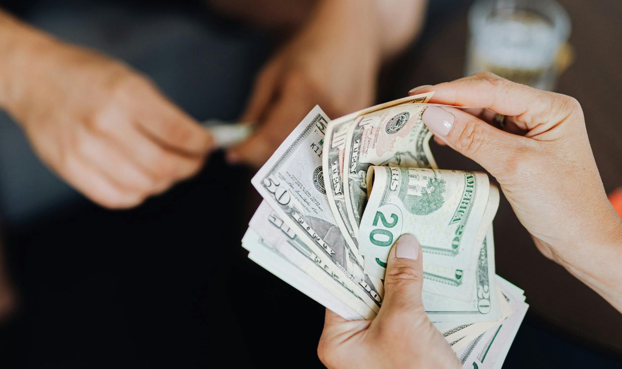 Person counting money