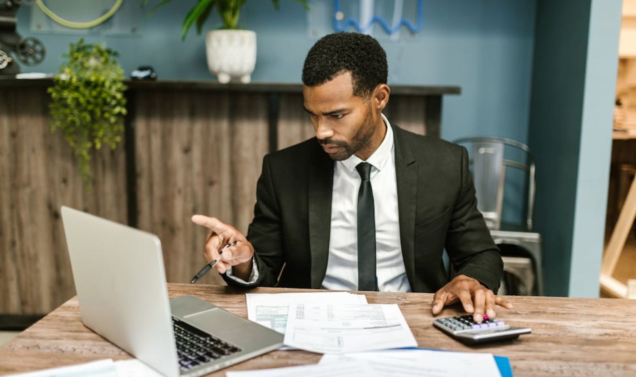 A Man Sitting at the Table
