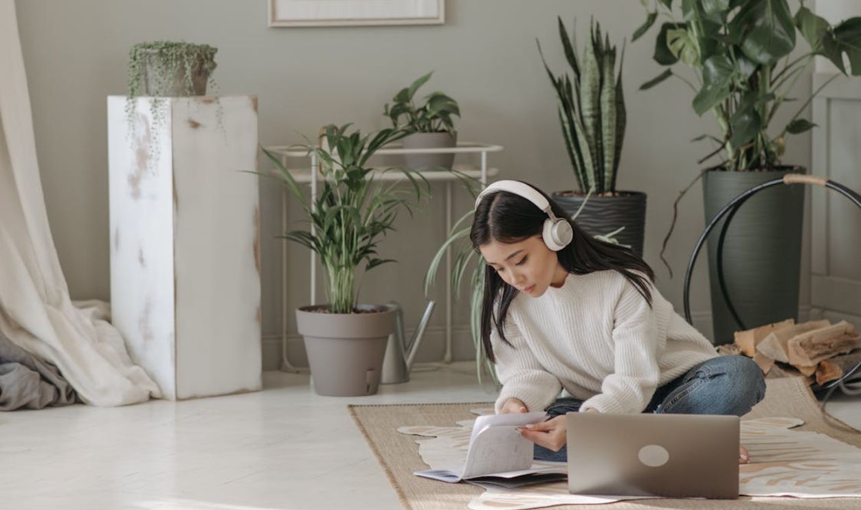 A Woman Looking the Notebook