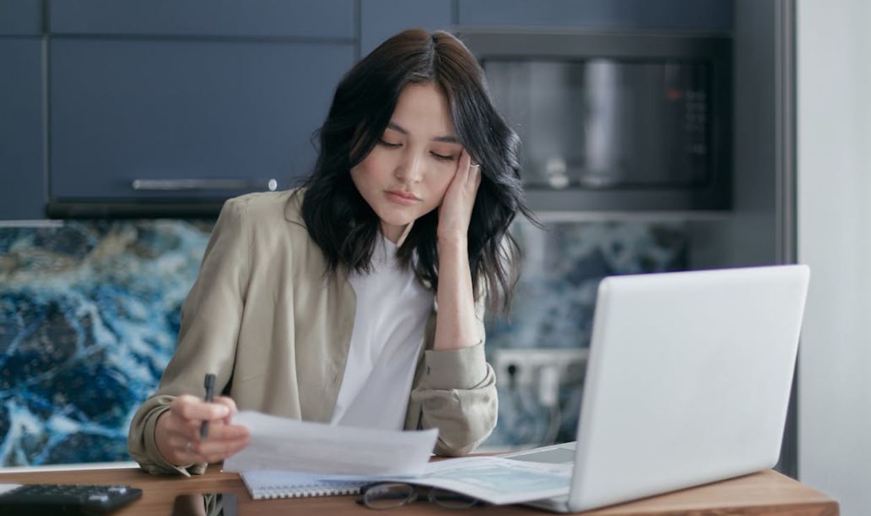Woman looking at Documents