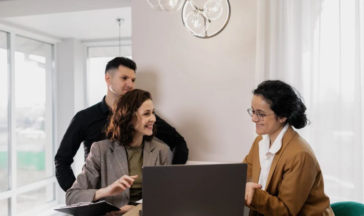 A Man and a Woman Talking to an Agent