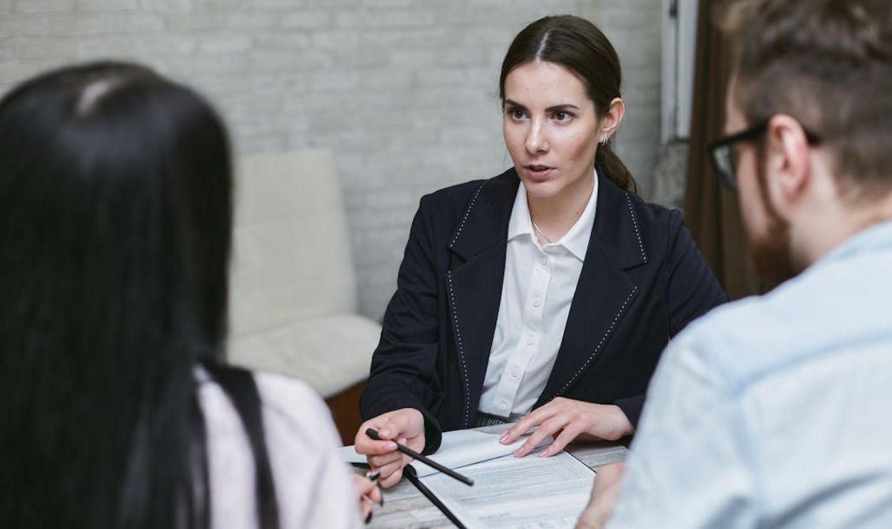 Woman in Black Blazer Talking