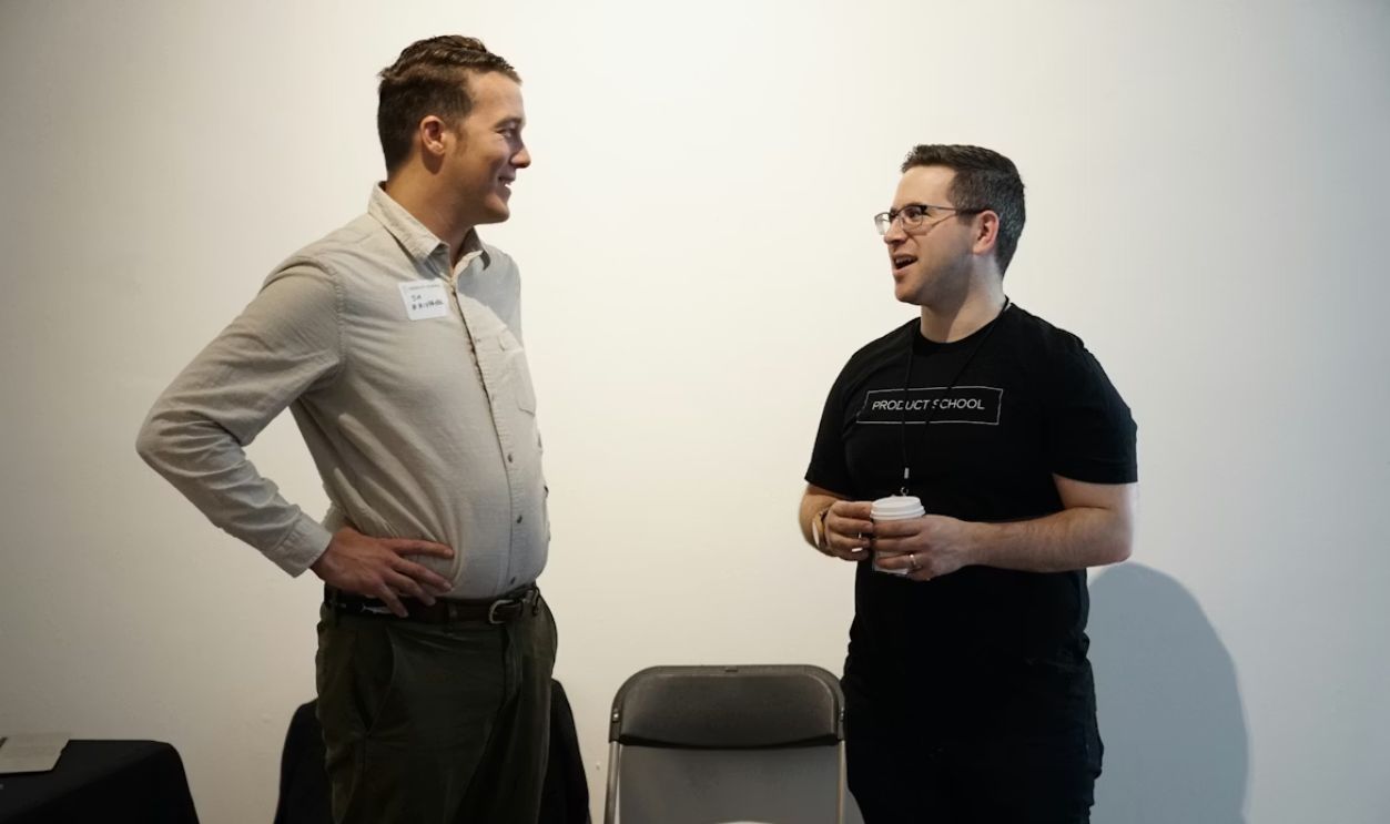 Two men talking to each other