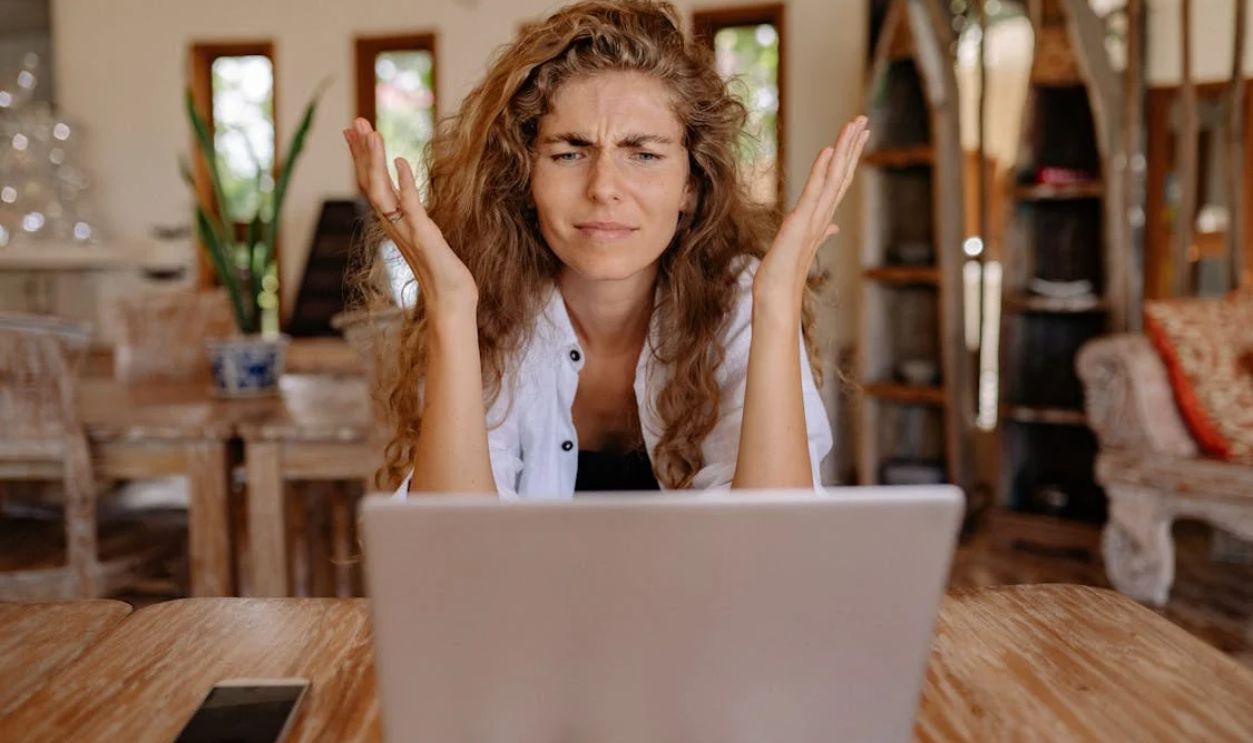Photo of Woman Showing Frustrations on Her Face
