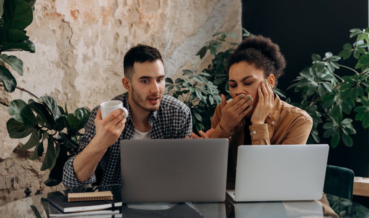 Man and Woman Sitting at Table