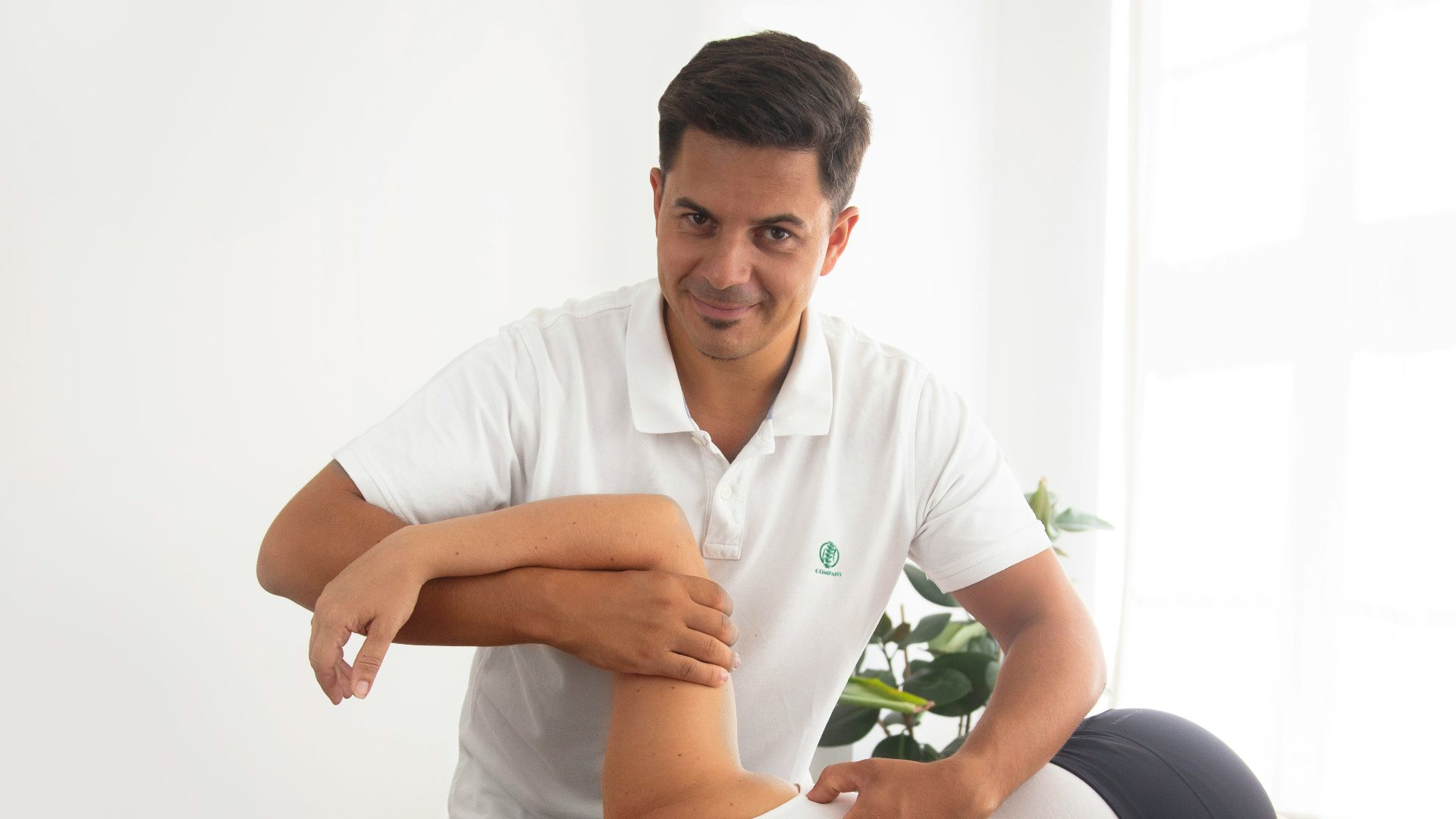 a woman getting a back massage from a man